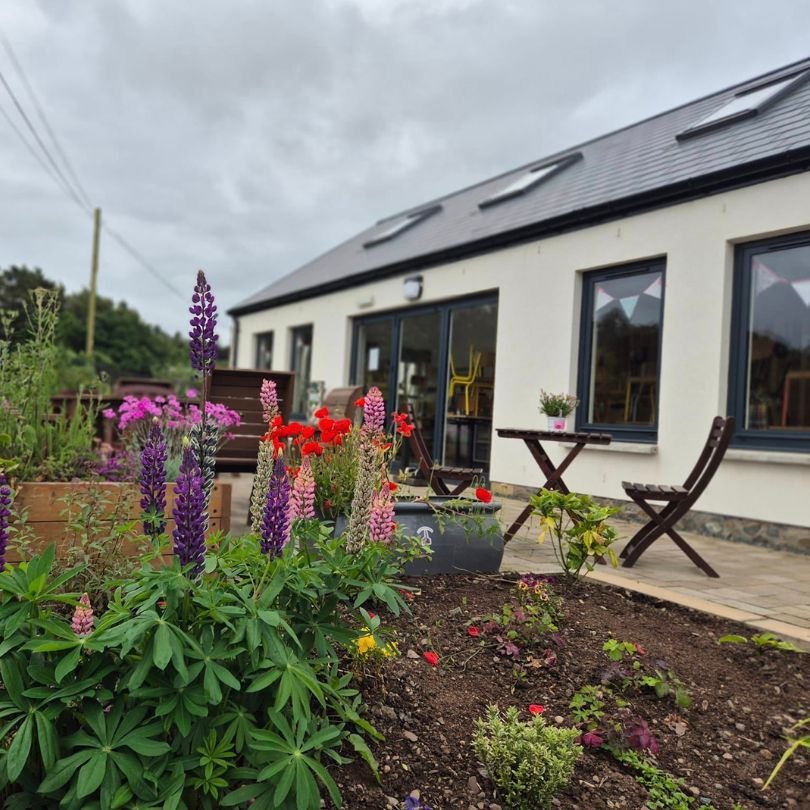 The Barn at Langloch with flowers External